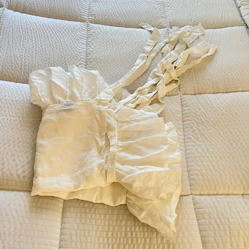 The White Linen Farmhouse brand white